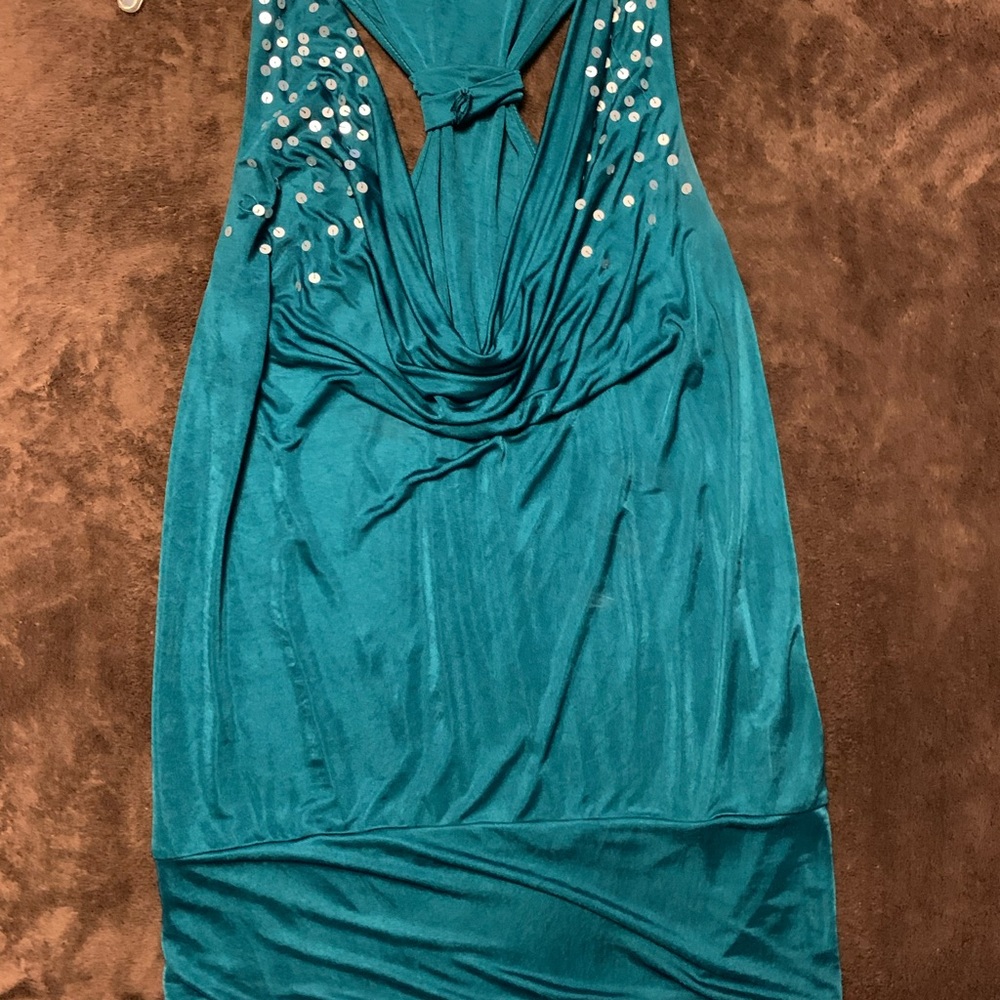 Medium green sleeveless blouse